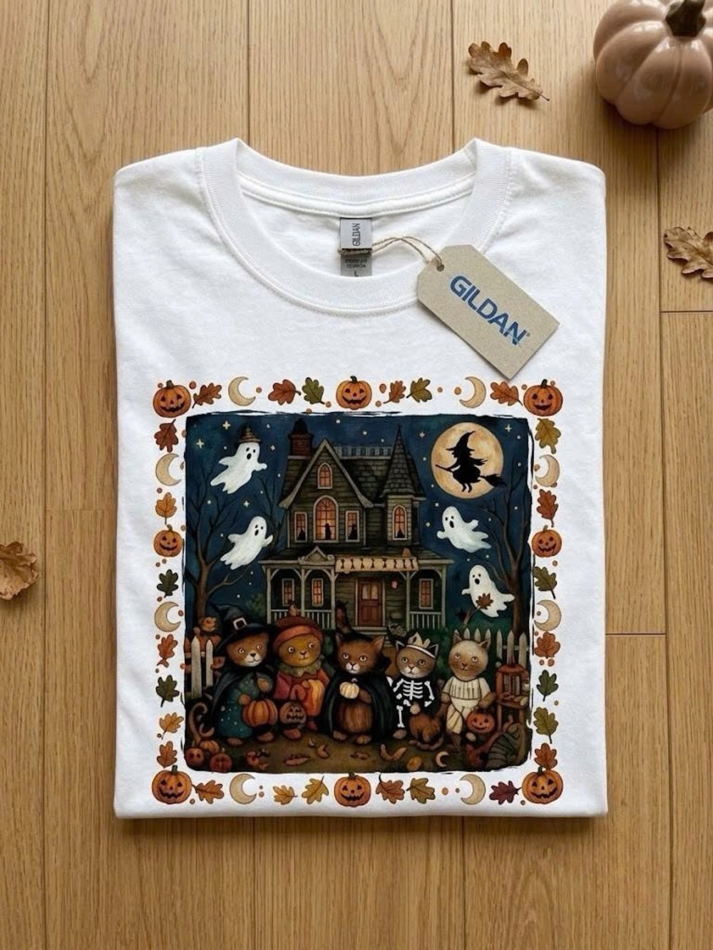Vintage Halloween Haunted House T-Shirt | Retro Spooky Costumed Cats Graphic Tee